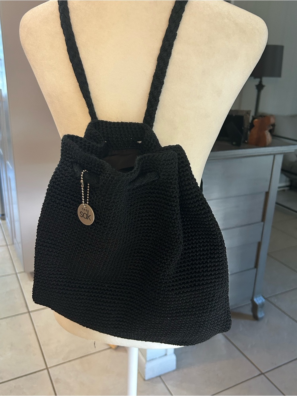 The Sak black drawstring bucket bag backpack